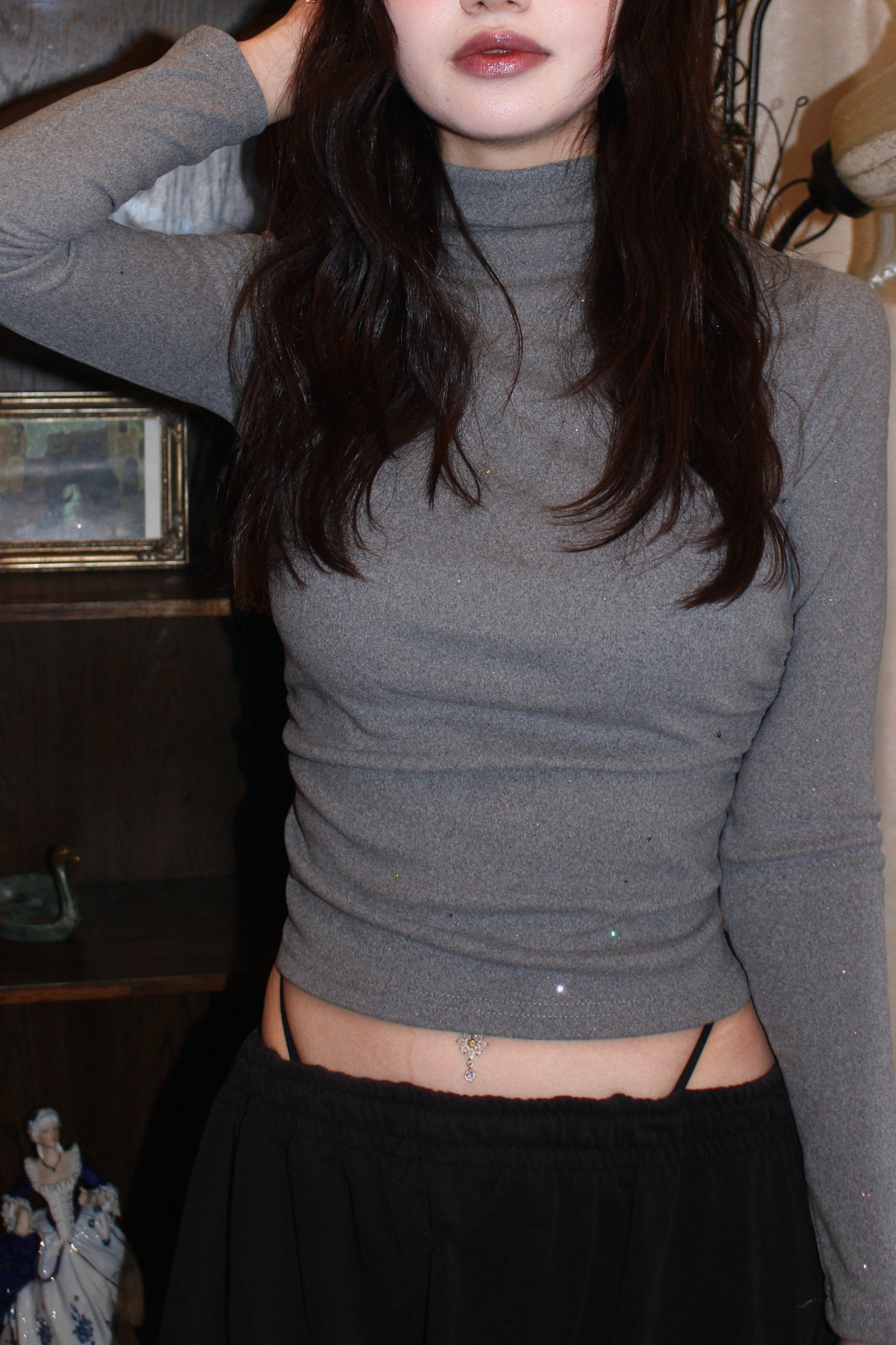 cropped brighter shirt.