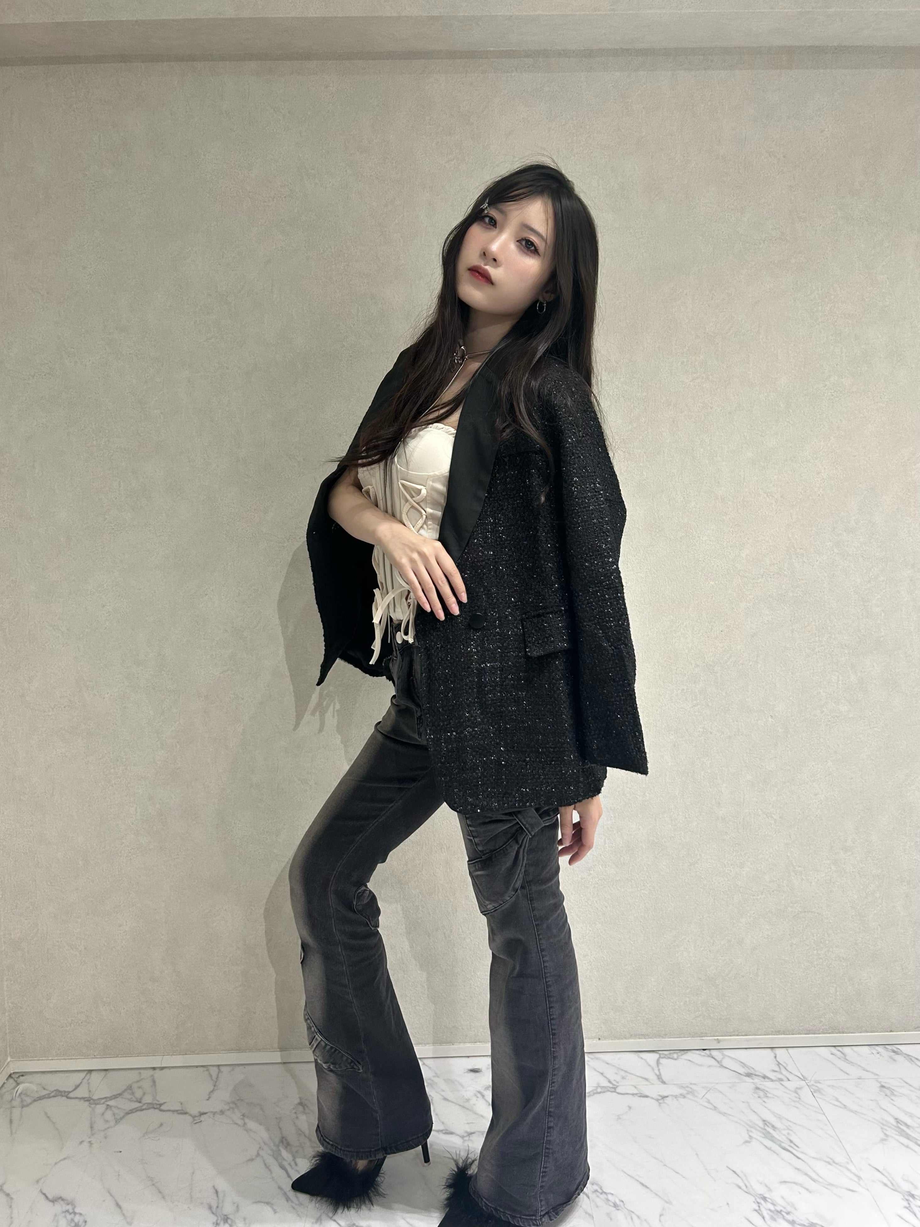 black tweed jacket.