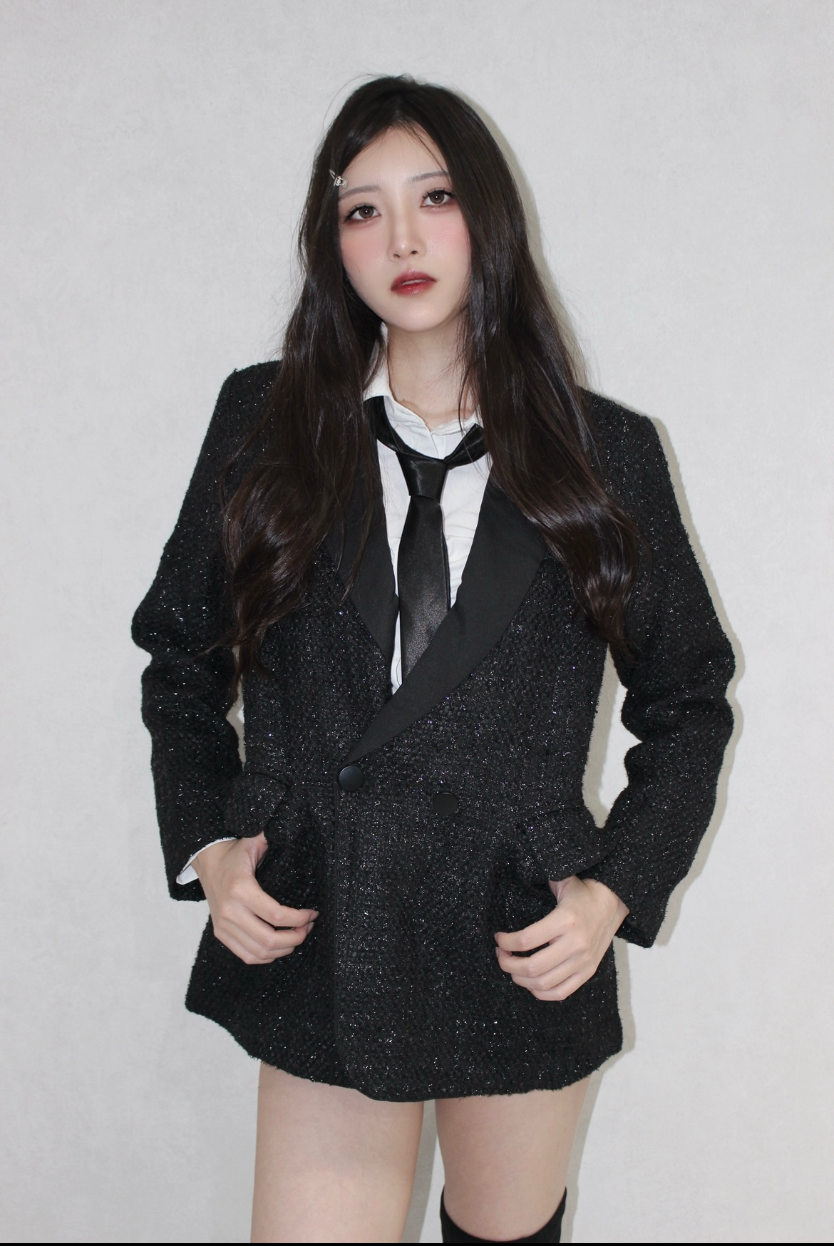black tweed jacket.