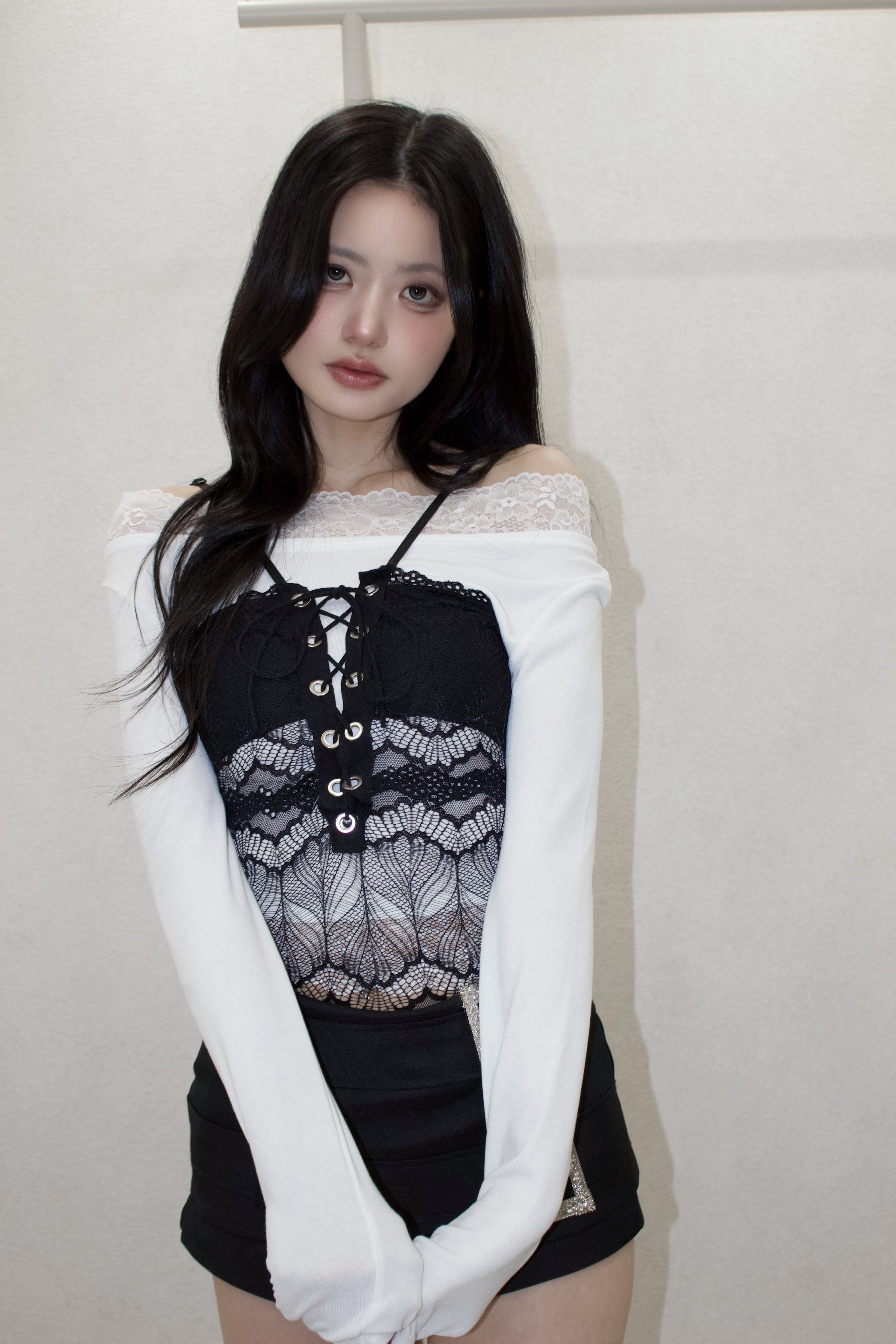 see-through body suit.