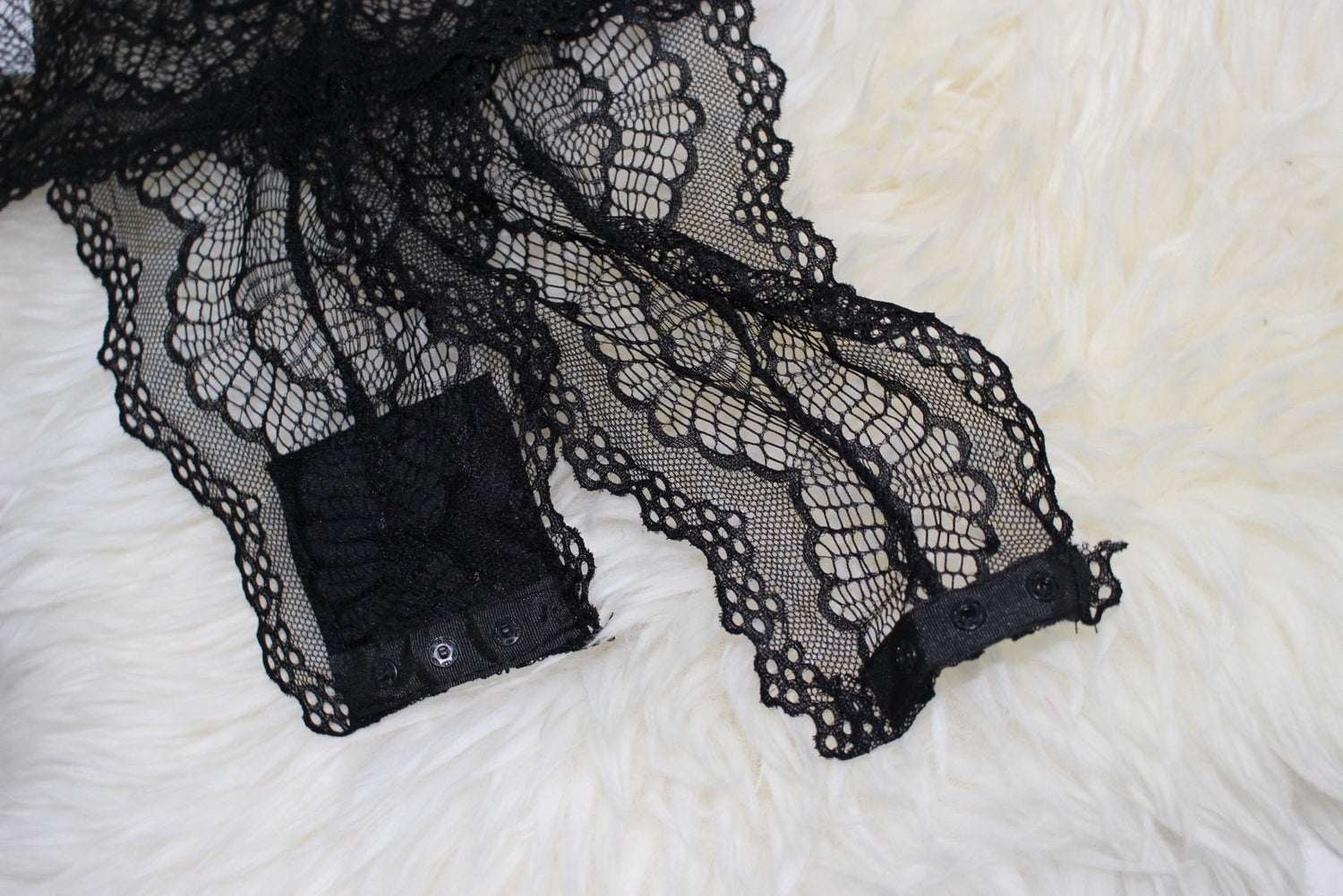 see-through body suit.