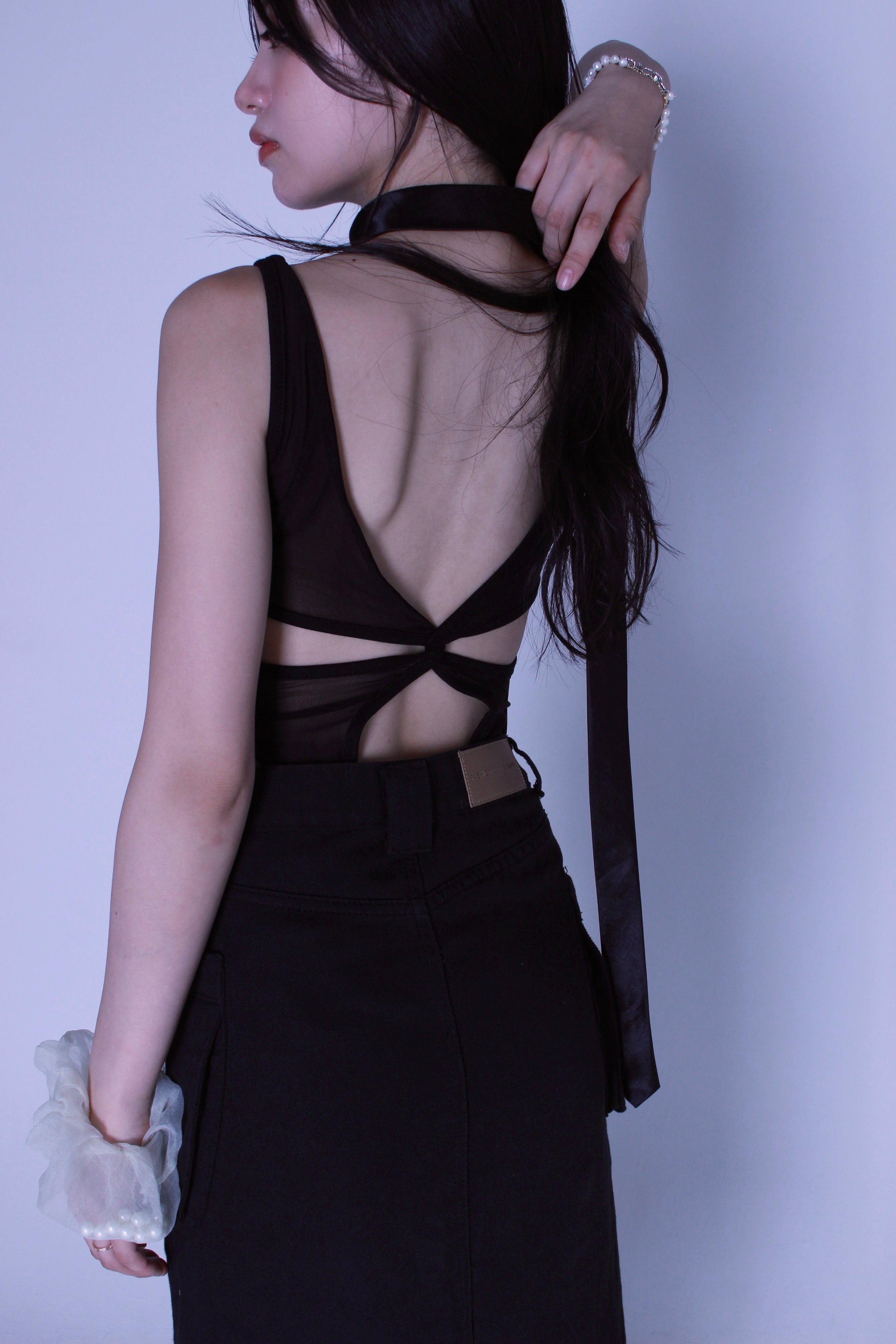 back line bodysuit.