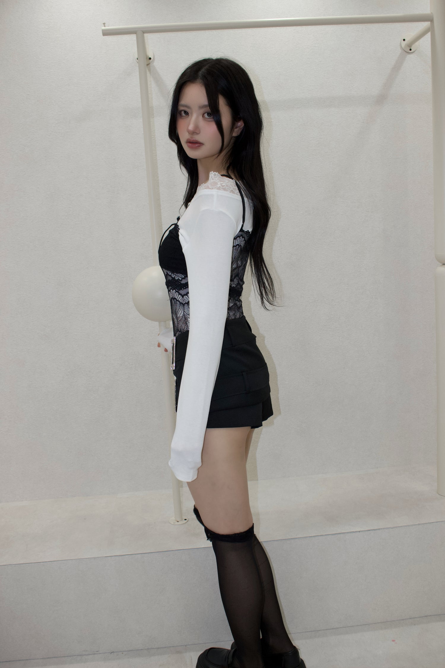 see-through body suit.