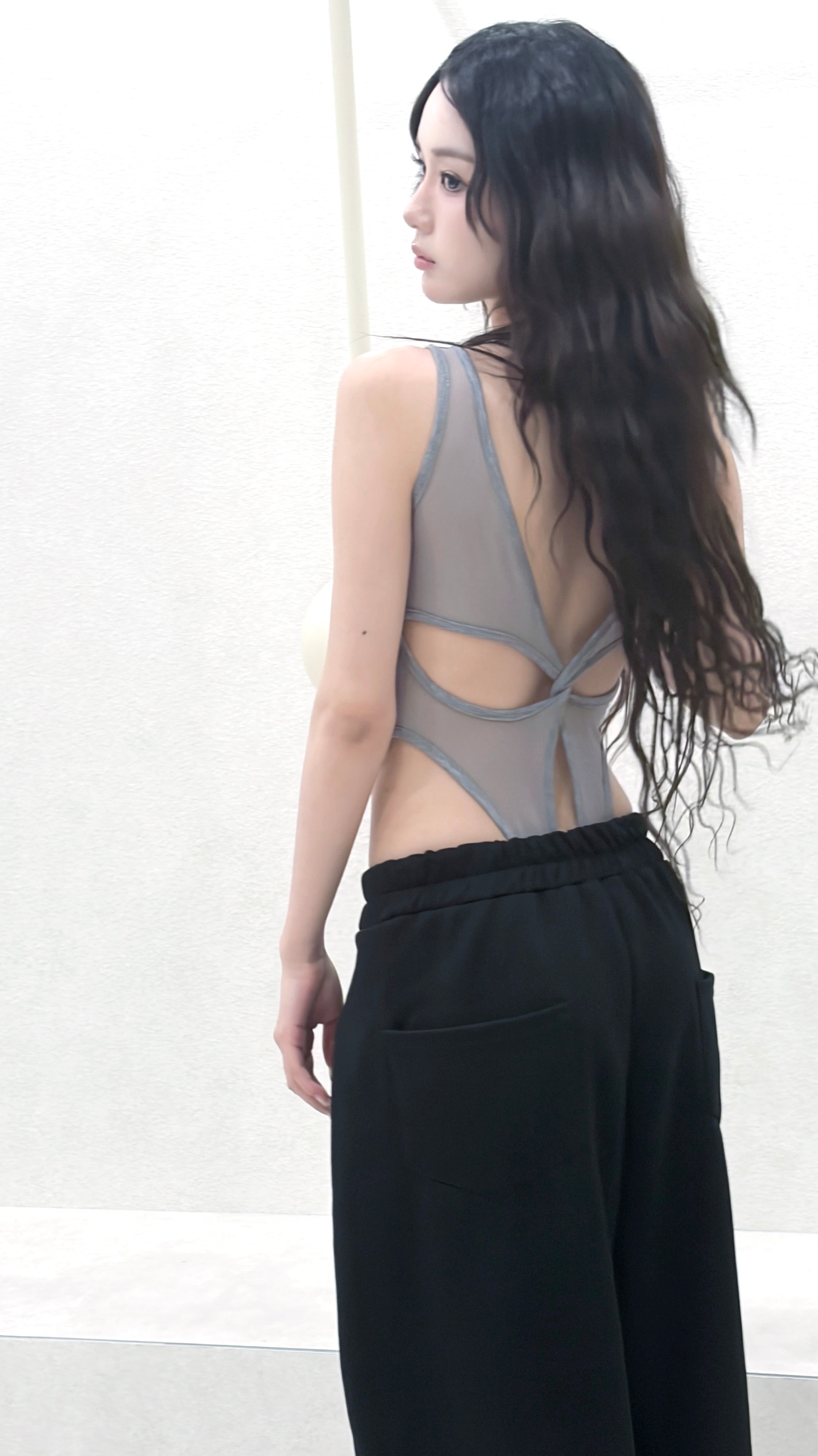 back line bodysuit.