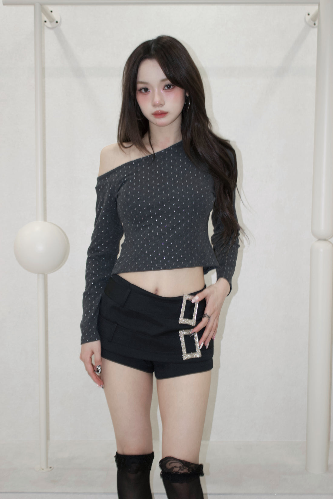 asym noir tops.